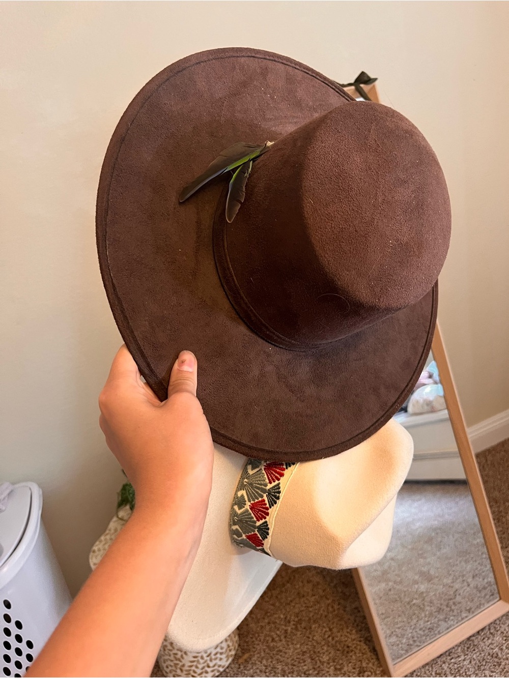 Ivory and brown Felt Hats with Black Trim and feather